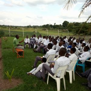 Dauson preaching the gospel at Busoga Farms